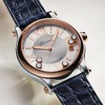 Chopard Happy Sport Damenuhr mit Gehaeuse in Stahl, Krone und Luenette in Rosegold, silbernem Zifferblatt mit roemischen Ziffern und 5 beweglichen Diamanten und blauem Lederarmband