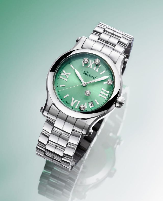Chopard Happy Sport Uhr in Stahl mit gruenem Zifferblatt vor gruenem Hintergrund