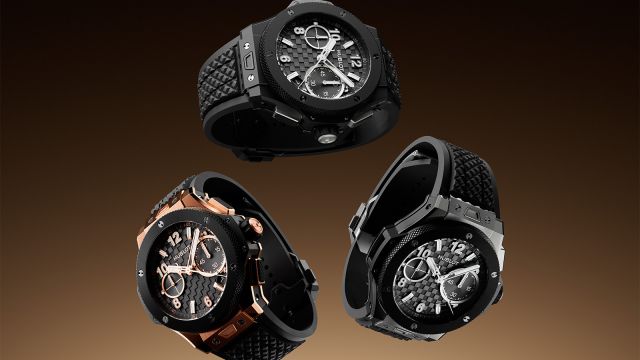 Mehrere Hublot Big Bang Chronographen mit schwarzem Zifferblatt und Kautschukarmband, verschiedene Geh&auml;usematerialien in dynamischer Schr&auml;gansicht