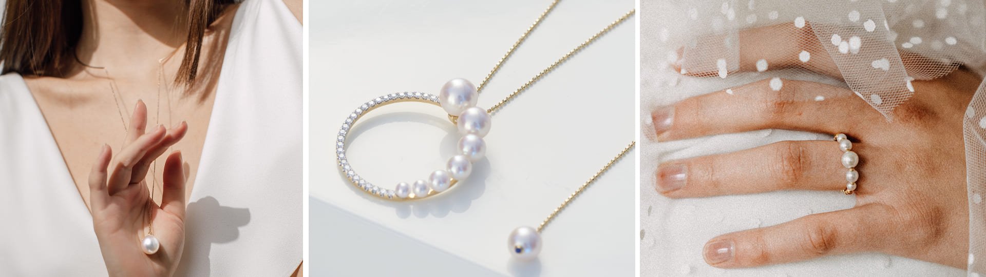 Yana Nesper Brautschmuck: zarte Halskette mit Perlanhänger, goldene Kette mit Ringanhänger und Perlen, Ring mit weißen Perlen auf Schleier.