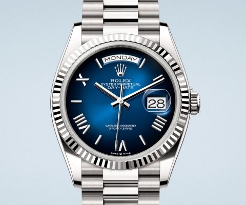 Rolex Day-Date Armbanduhr aus Edelstahl mit blauem Zifferblatt, geriffelter L&uuml;nette, Pr&auml;sidentenarmband sowie Wochentagsanzeige und Datumsfenster mit Zykloplupe