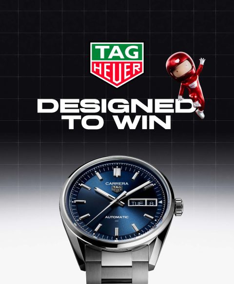 TAG Heuer Carrera Automatikuhr mit blauem Zifferblatt, Tag Heuer Logo und Slogan ‚Designed to Win‘ mit einem Rennfahrernikolaus. TAG Heuer Carrera Automatikuhr mit blauem Zifferblatt, Tag Heuer Logo und Slogan ‚Designed to Win‘ mit einem Rennfahrernikolaus.