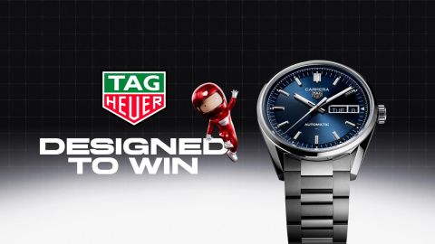 TAG Heuer Carrera Automatikuhr mit blauem Zifferblatt, Tag Heuer Logo und Slogan ‚Designed to Win‘ mit einem Rennfahrernikolaus. TAG Heuer Carrera Automatikuhr mit blauem Zifferblatt, Tag Heuer Logo und Slogan ‚Designed to Win‘ mit einem Rennfahrernikolaus.
